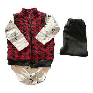 Red and Black Quilted Vest with White Graphic Onesie and Gray Pants
